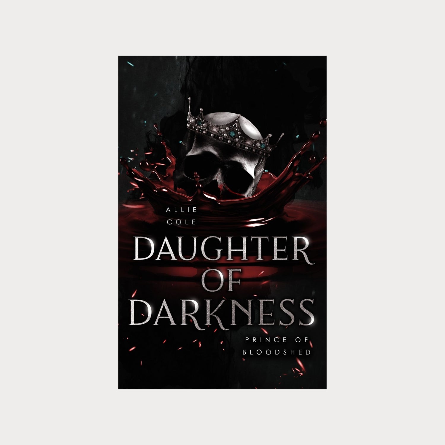 Book cover of Daughter of Darkness Prince of Bloodshed by Allie Cole, a dark fantasy romance novel. The cover features a silver skull wearing a jeweled crown emerging from a pool of red liquid with a dark and eerie background